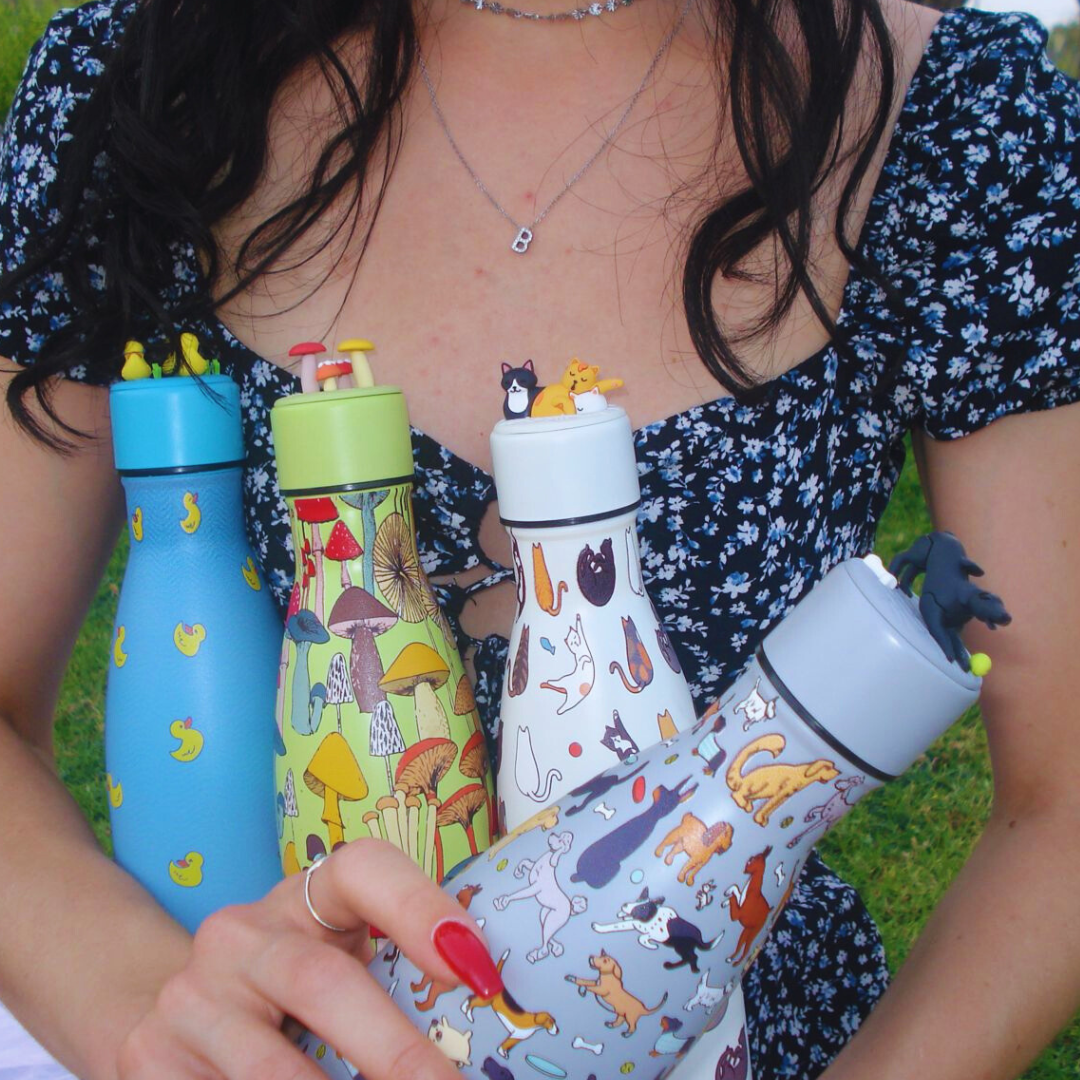 girl holding bottles